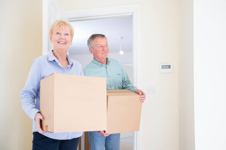 Senior couple downsizing during their retirement and moving into their new home.
