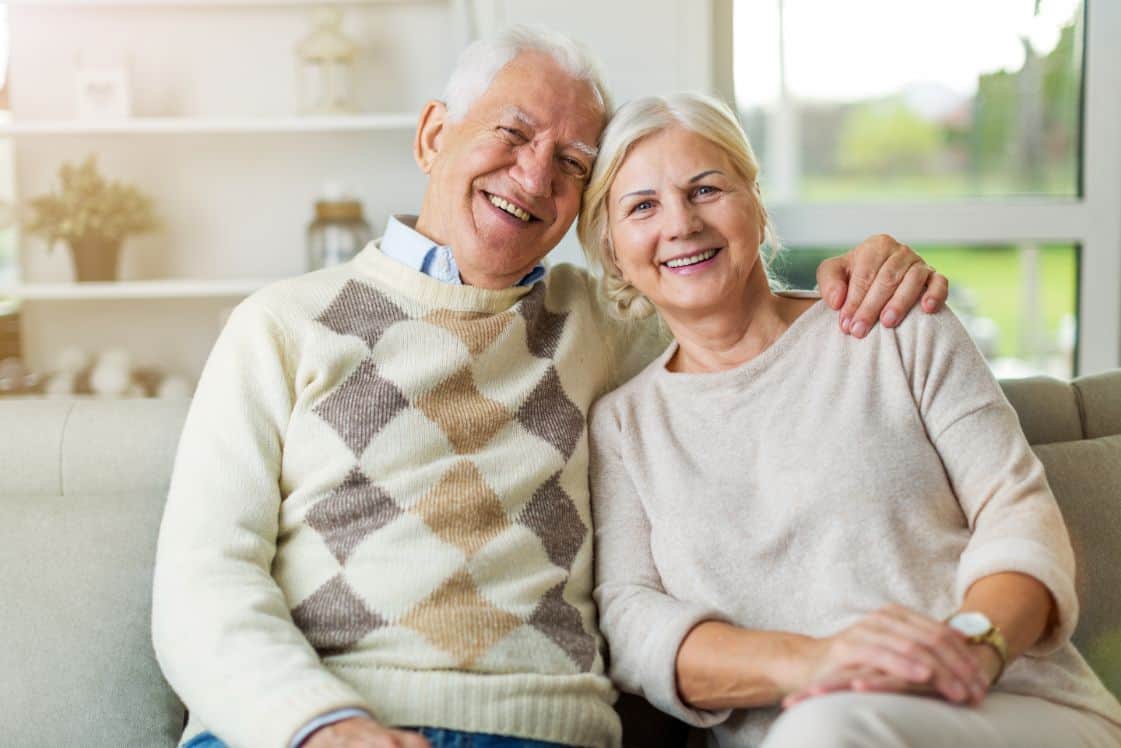 Happy senior couple enjoying the benefits of senior living.