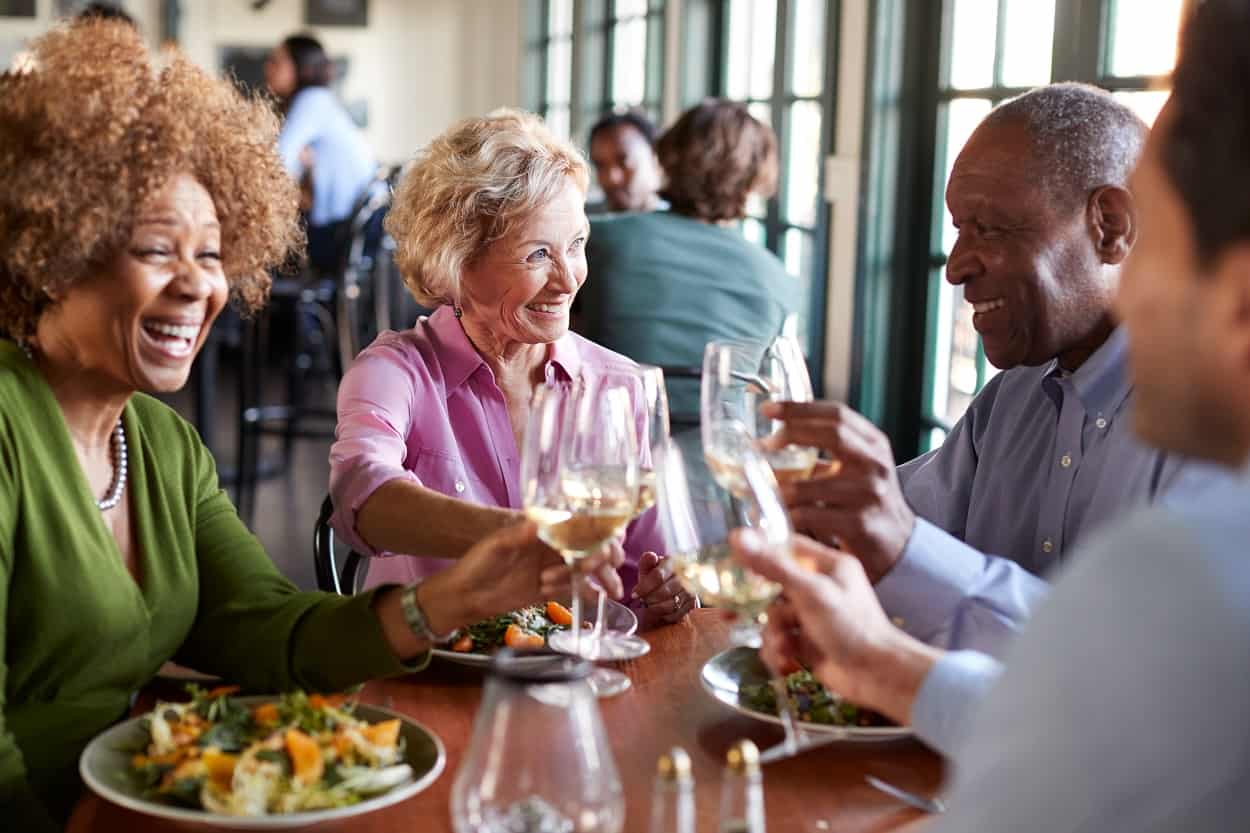 seniors enjoying dinner at a resturant
