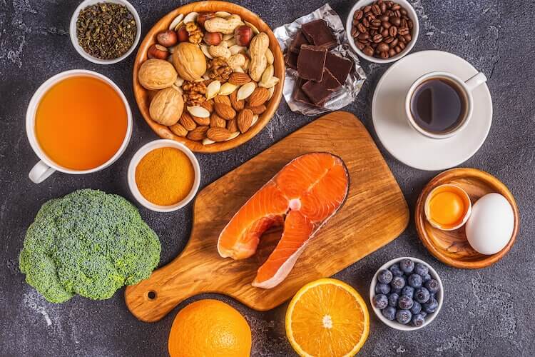 A spread of the best food for the brain, including salmon, coffee, nuts and eggs.