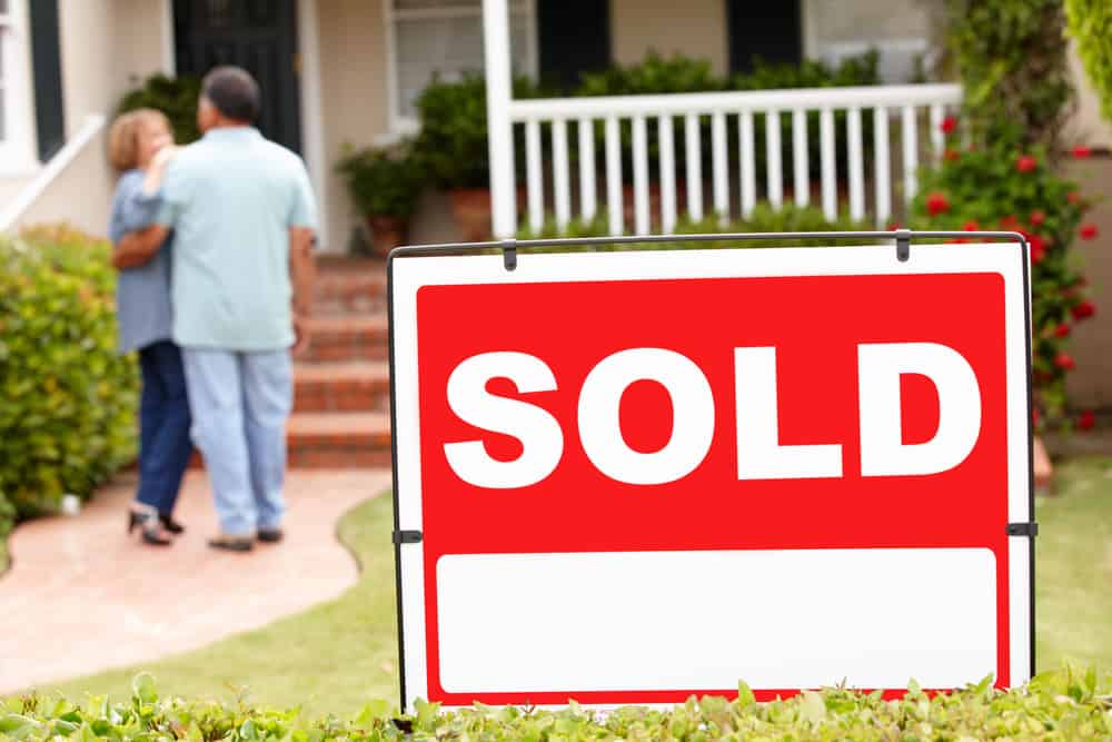 A senior couple selling their home